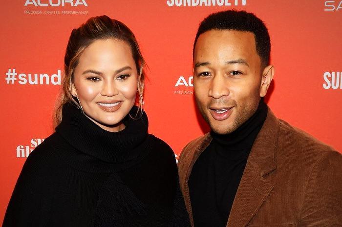 Chrissy Teigen Shares Video of Hubby Helping Into Maternity Leggings