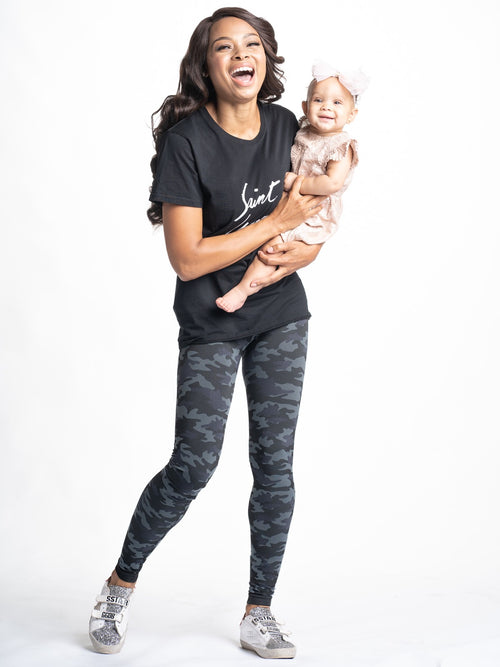 Lifestyle shot of Snapback™ Postpartum Leggings - Black Camo (2 Pack)
